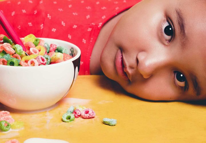 A child with a bowl of extruded breakfast cereals - Photo by Tiago Pereira from Pexels